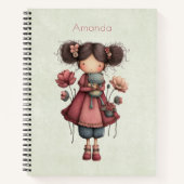 かわいいカエルのぬいぐるみを持つ女の子 ファンシー ノートブック (正面)