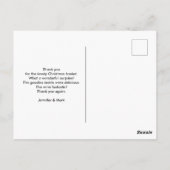 かわいいキティ猫が赤いサンタ帽をかじっている クリスマスありがとう ポストカード (裏面)