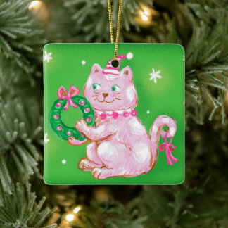 かわいいキャラクターのクリスマス猫がクリスマスのリースを持っている セラミックオーナメント