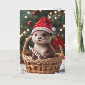 かわいいクリスマスのオッターの赤ちゃんがバスケットに入ったホリデーカード シーズンカード (正面)