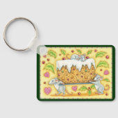 かわいいクリスマスのネズミがフルーツケーキのデザートを運ぶ キーホルダー (裏面)