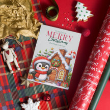 かわいいクリスマスのペンギンとジンジャーブレッドハウス