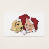 かわいいクリスマスのラブラドール子犬とオレンジ色のタビー猫 (正面)
