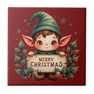 かわいいクリスマスエルフがメリーのサインを持っている タイル