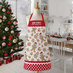 かわいいクリスマスクッキーベーキングクルーエプロン エプロン<br><div class="desc">ジンジャーブレッドのクッキーパター飾ンを付けたキュートなクリスマスクッキーベーキングクルーエプロン。自分の名前でカスタマイズする。エプ縁どロの水玉模様は赤と白ric racのパターンである。クリスマスのおもしろいギフトを作る。Blackberry Boulevardによって設計。</div>