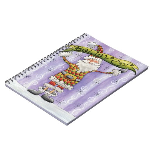 かわいいクリスマス　カートゥーン　サンタクロースを信じてる ノートブック (左側)