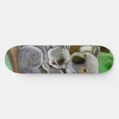 かわいいコアラおよびベビー スケートボード (横)