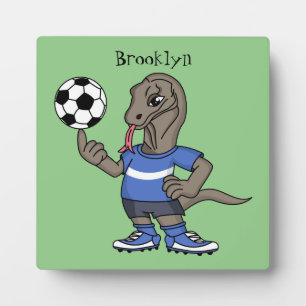 かわいいコモドドラゴンがサッカーをしている漫画 フォトプラーク