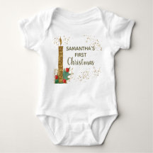 かわいいゴールドグリッターキャンドルが最初のクリスマスを飾る