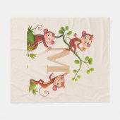 かわいいサル3匹とゴールデンモノグラムアイボリー フリースブランケット (正面(横))