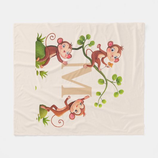 かわいいサル3匹とゴールデンモノグラムアイボリー フリースブランケット (正面(横))