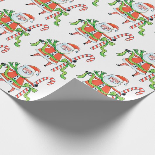 かわいいサンタクロースと巨大キャンディーケインとお辞儀 ラッピングペーパー (角)