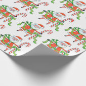 かわいいサンタクロースの巨大キャンディーケーンとリボン ラッピングペーパー (角)