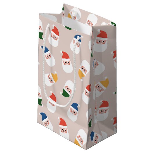 かわいいサンタ顔クリスマスパターン スモールペーパーバッグ (正面アングル)