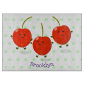 かわいいジャンプ赤さくらんぼ漫画イラストレーション カッティングボード (正面)