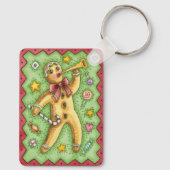かわいいジンジャーブレッドマンがホルンを吹く、クリスマスのお菓子 キーホルダー (裏面)