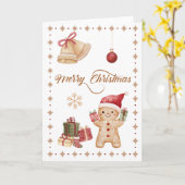 かわいいジンジャーブレッドマンの水色「メリークリスマス」 カード (黄色い花)