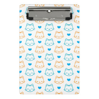 かわいいターコイズとオレンジの猫の顔パターン ミニクリップボード