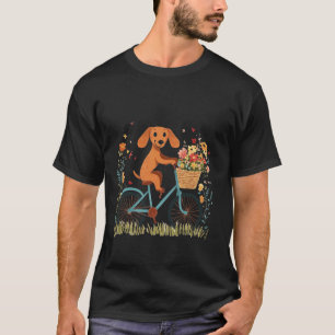 かわいいダックスフンドが自転車に乗って春の花を Tシャツ
