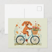 かわいいダックスフンドの犬が自転車で春の花を運ぶ ポストカード (正面/裏面)
