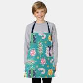 かわいいティール（緑がかった色）ピンクと黄色のクリスマスアイテム エプロン (着用した状態)