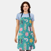 かわいいティール（緑がかった色）ピンクと黄色のクリスマスアイテム エプロン (着用した状態)