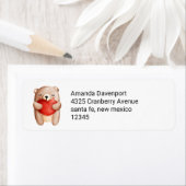 かわいいテディベアが赤いハートを抱えている ラベル (インサイチュ)