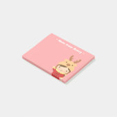 かわいいトナカイの女の子はクリスマスの注入口をからかいます ポストイット (アングル)