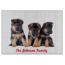 かわいいドイツの羊飼い子犬のカッティングボード