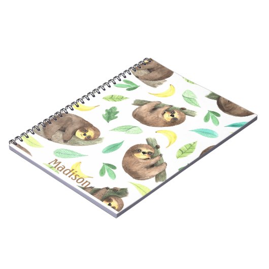 かわいいナマケモノが枝に座り、浮かんだバナナ。とってもかわいい！バナナとナマケモノが好き。ナマケモノ ノートブック (左側)