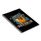 かわいいナマケモノの自閉症の服装は、ユニケにしがみつく ノートブック (右側)