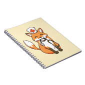 かわいいノートを引いている医者またはナースのキツネ ノートブック (右側)