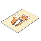 かわいいノートを引いている医者またはナースのキツネ ノートブック (左側)