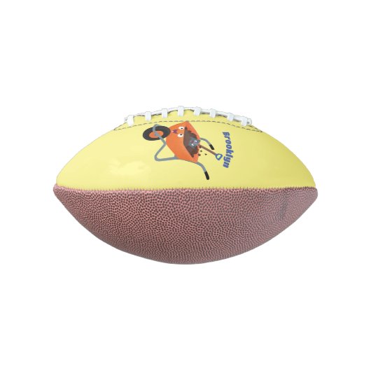 かわいいハッピーオレンジの手押し車のカートゥーンイラストレーション アメリカンフットボール (回転90)