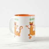 かわいいハッピーオレンジ踊りnewt ツートーンマグカップ (正面左)