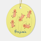 かわいいハッピージャンプ落花生の漫画イラストレーション セラミックオーナメント (左)