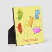 かわいいハッピーゼリービーンズ跳び漫画イラストレーション フォトプラーク (正面)