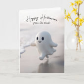 かわいいハロウィンの幽霊がビーチを走る カード (黄色い花)