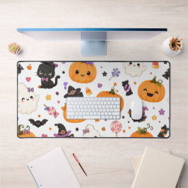 かわいいハロウィンパターンのかぼちゃのデザイン デスクマット