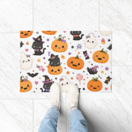 かわいいハロウィンパターンのかぼちゃのデザイン ドアマット