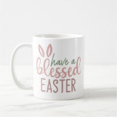 かわいいバニーの耳がイースター賛美を持つ コーヒーマグカップ (左)