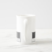 かわいいピアノの鍵は笑顔でマグカップ顔 ボーンチャイナマグカップ (裏面)