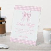 かわいいピンクのジンガム弓ベビーガールおむつラッフル 台座サイン (インサイチュ)