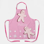 かわいいピンクのジンジャーブレッド雪の結晶クリスマス エプロン (正面)