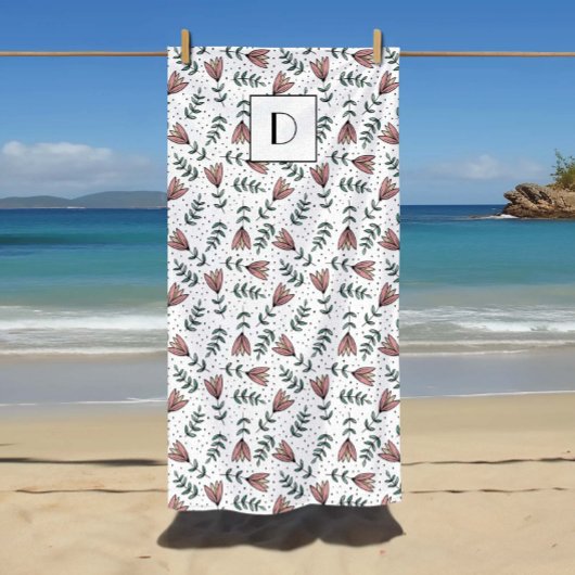 かわいいピンクのフローラ花あなたの名前をパターン ビーチタオル