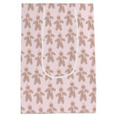 かわいいピンクの冬のジンジャーブレッドマン ミディアムペーパーバッグ (裏面)