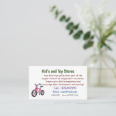 かわいいピンクの子供たち自転車の漫画イラストレーション 名刺 (スタンド正面)