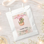 かわいいピンクの恐竜がもうすぐ生まれる フェイバーバッグ (クリップ留めされた状態)