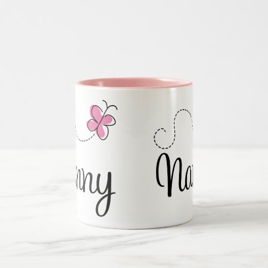 かわいいピンクの蝶乳母 ツートーンマグカップ (中央)