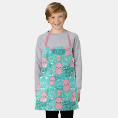 かわいいピンクの豚のティール(緑がかった色)水彩模様名 エプロン (着用した状態)